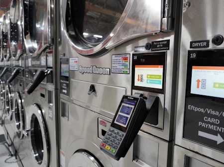 1 Speed Queen Quantum Touch washers with a card payment reader at the Wishy Washy laundromat